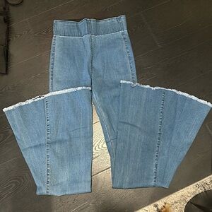 Three birds nest flares jeans